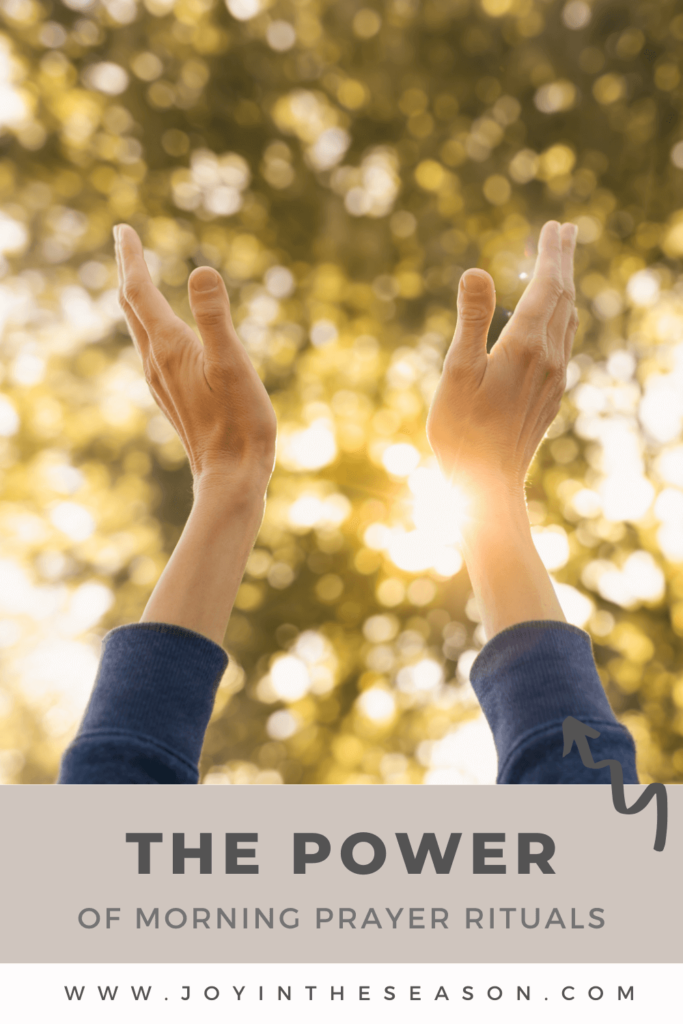 Woman reaching towards sky in prayer