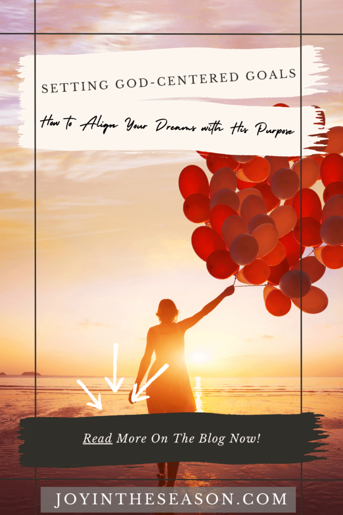 Woman walking into sunset with red balloons